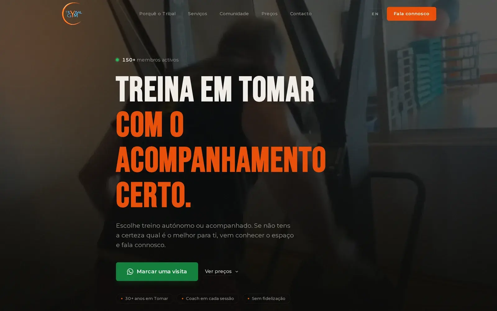 Tribal Gym homepage on a laptop, Portuguese version, with the headline Treina em Tomar com o acompanhamento certo.
